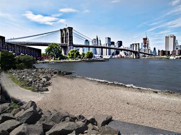 A unique photo of the Brooklyn Bridge and the shore line